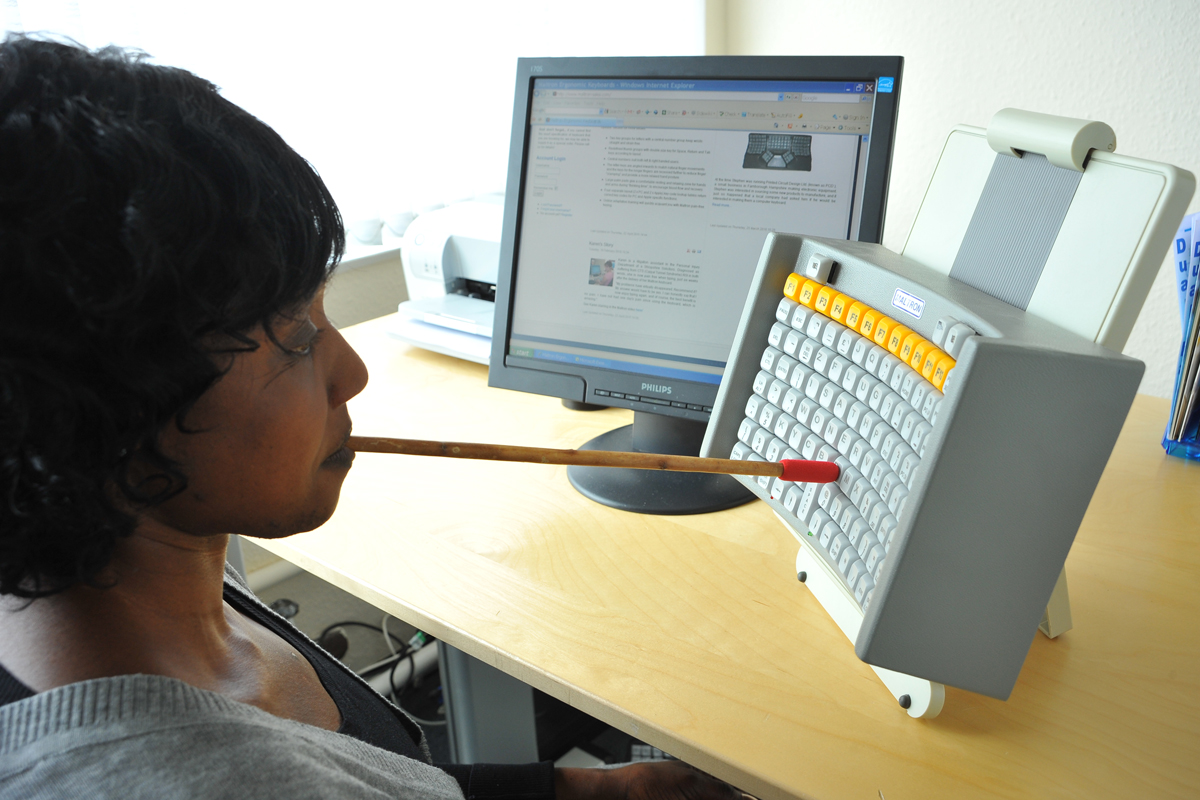 Image showing typing with a head stick